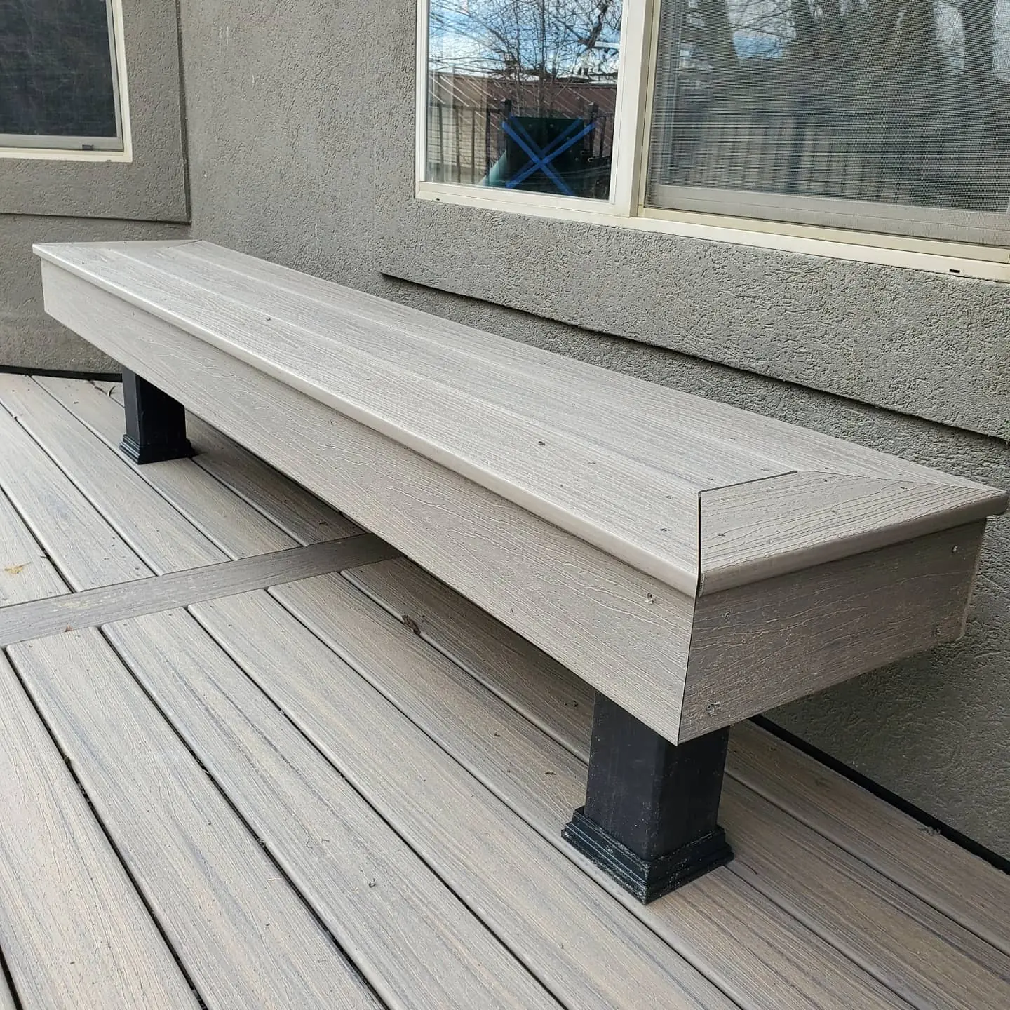 Built-in composite bench on a deck