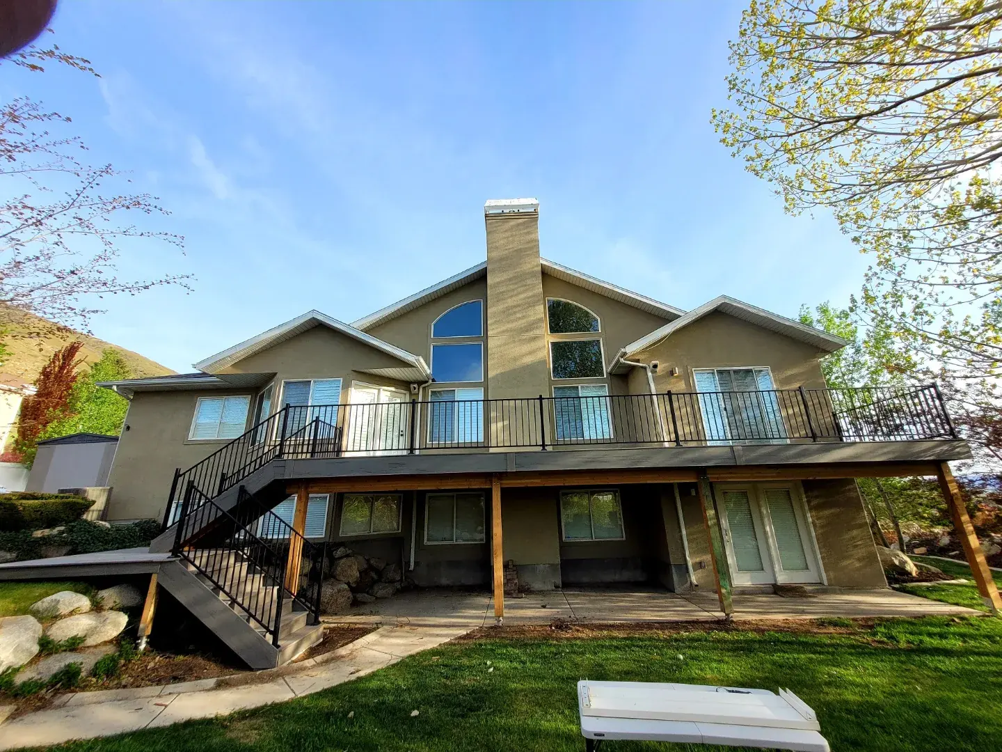 Full-width elevated composite deck rebuilt by TC Decks