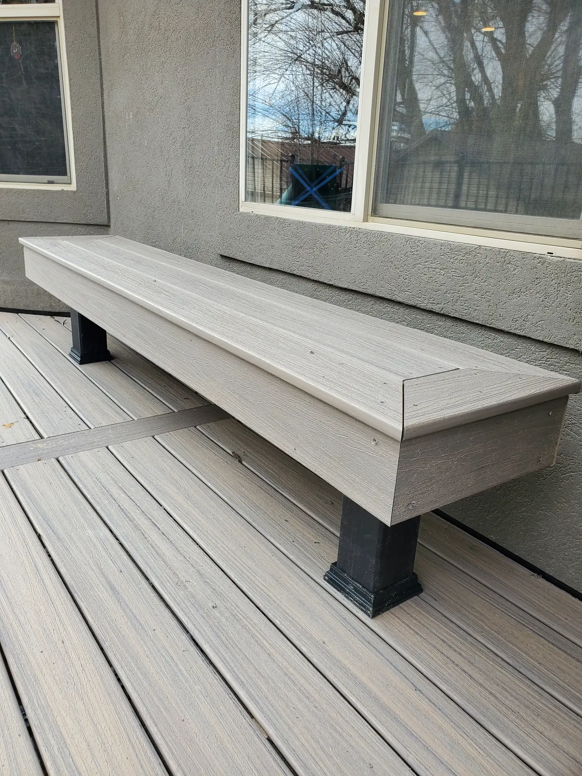 Built-in composite bench on a deck