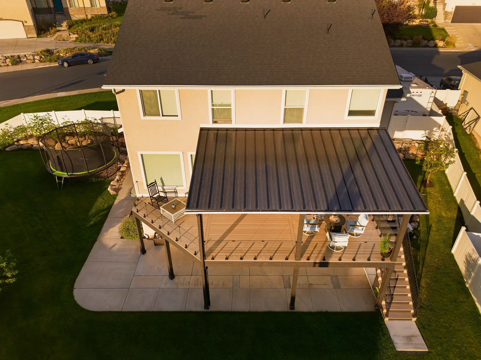 Aerial view of a covered deck with a metal roof