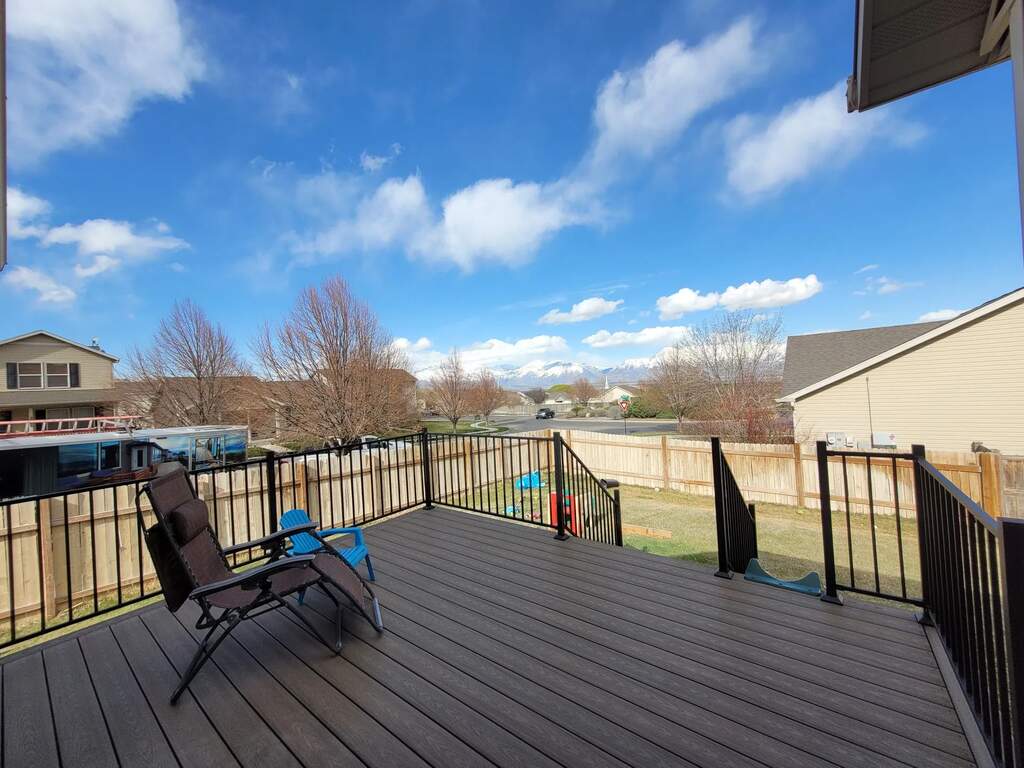 Relaxation and conversation are invited by chairs in front of patios designed by TC Decks.