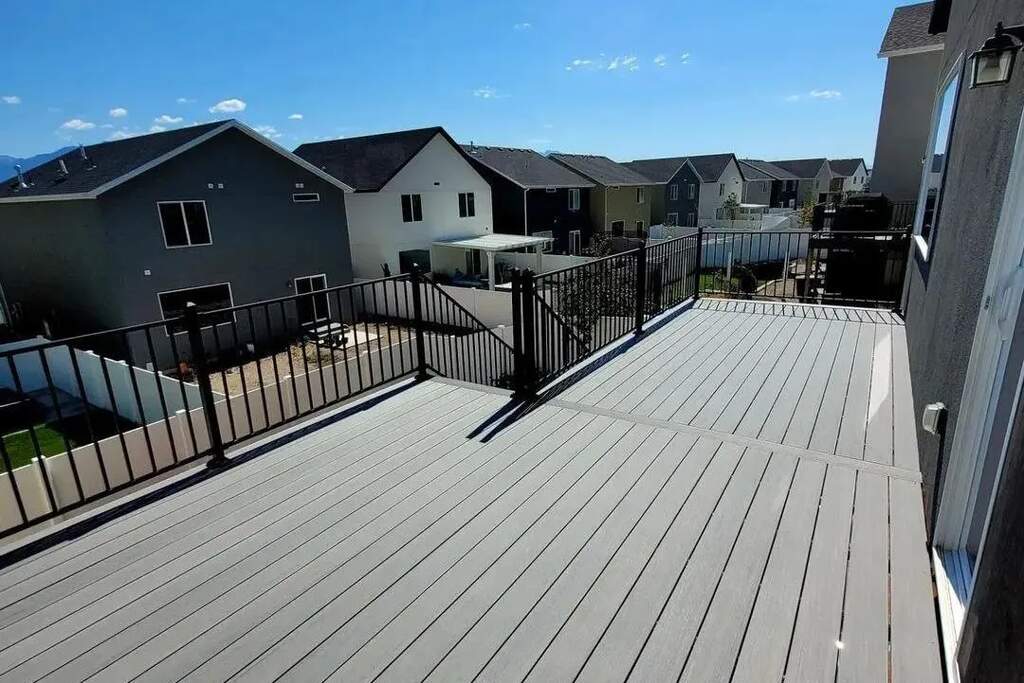Expansive living spaces feature balconies and patios by TC Decks.