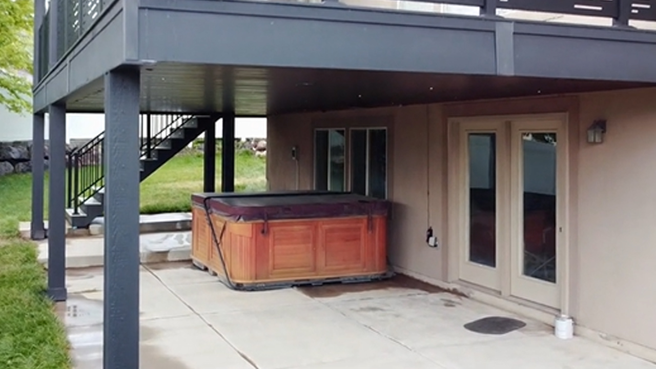 Open your garage door to TC Decks' innovative deck renovation solutions.